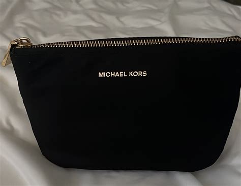 Michael kors cosmetic bags + FREE SHIPPING .